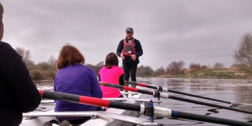 Experienced rower explaining the rowing sequence